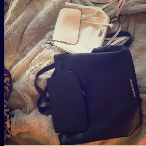 2 Vs leather bookbags